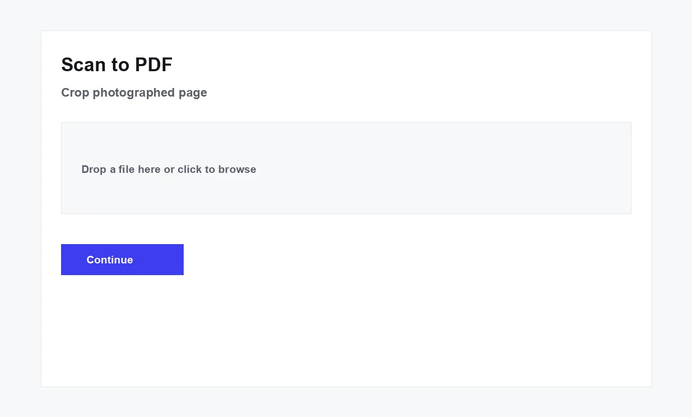 Scan to PDF's crop screen with a photographed document and a draggable crop box over it